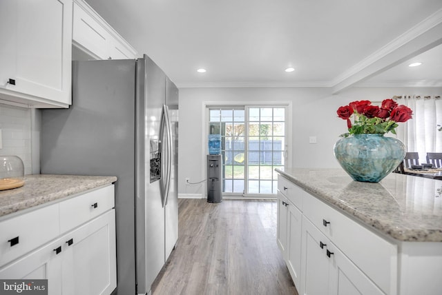 32 Meadowlark Ln, Willingboro, NJ 08046 - kitchen with light wood-style floors, backsplash, stainless steel fridge, ornamental molding, and white cabinetry