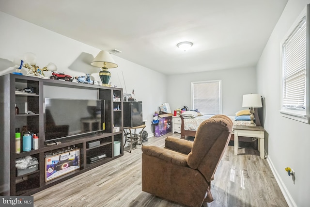 32 Meadowlark Ln, Willingboro, NJ 08046 - living area with baseboards, visible vents, and wood finished floors