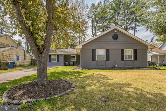 32 Meadowlark Ln, Willingboro, NJ 08046 - view of front of property with a front yard and brick siding