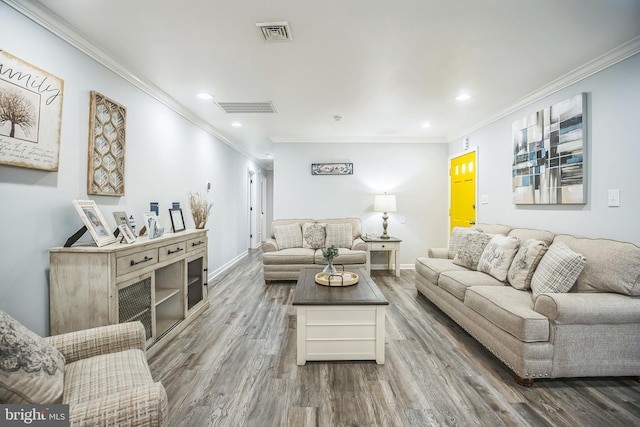 32 Meadowlark Ln, Willingboro, NJ 08046 - living room featuring ornamental molding, recessed lighting, wood finished floors, and visible vents