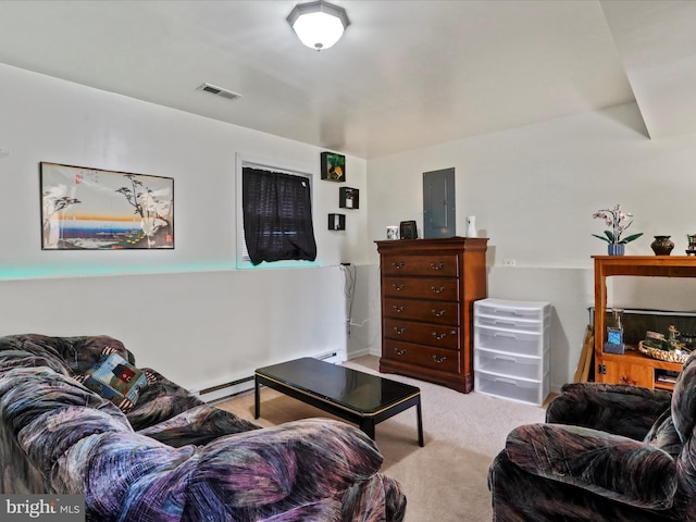 living room with visible vents, a baseboard radiator, and carpet