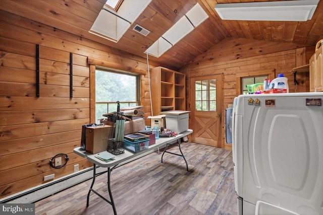 365 Stoney Bottom Rd, Front Royal, VA 22630 - office space with washer / dryer, wooden walls, lofted ceiling, healthy amount of natural light, and light wood-type flooring