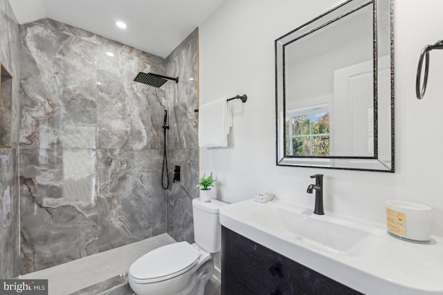 full bath featuring recessed lighting, a marble finish shower, toilet, and vanity