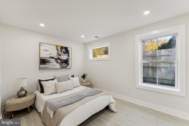 bedroom featuring visible vents, recessed lighting, and baseboards