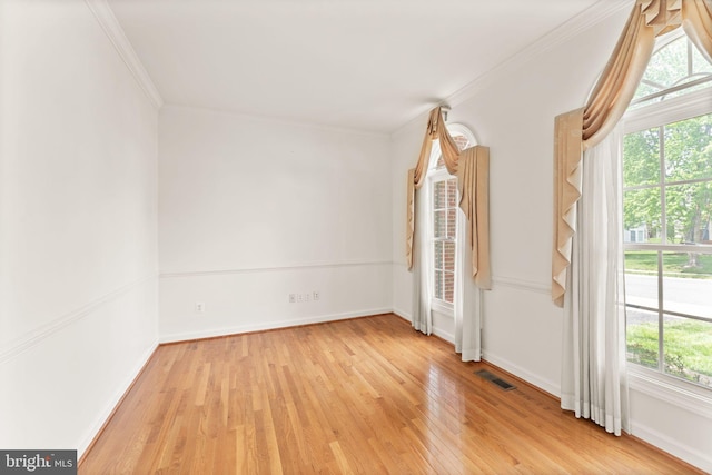 42935 Palliser Ct, Leesburg, VA 20176 - spare room with ornamental molding, visible vents, light wood finished floors, and baseboards