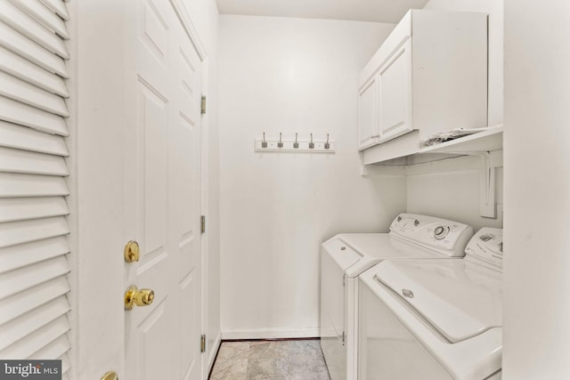 42935 Palliser Ct, Leesburg, VA 20176 - laundry room with baseboards, cabinet space, and washer and clothes dryer