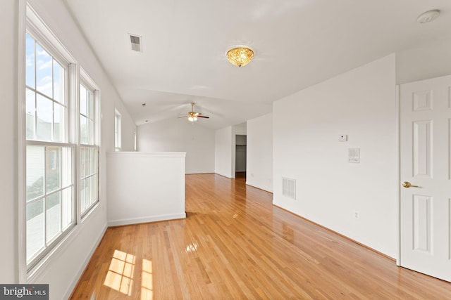 42935 Palliser Ct, Leesburg, VA 20176 - empty room featuring visible vents, ceiling fan, light wood-style flooring, and baseboards