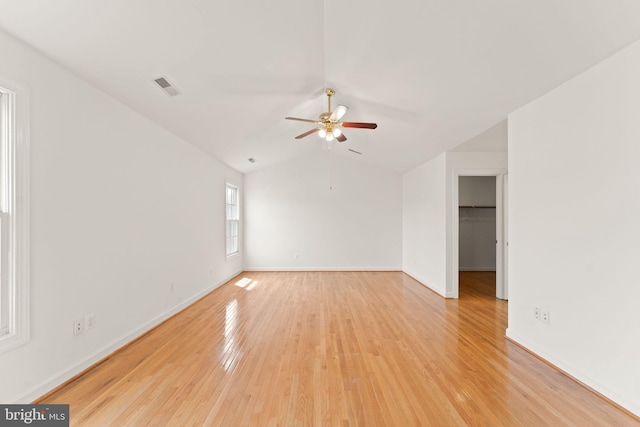 42935 Palliser Ct, Leesburg, VA 20176 - unfurnished living room featuring visible vents, a ceiling fan, light wood finished floors, and vaulted ceiling