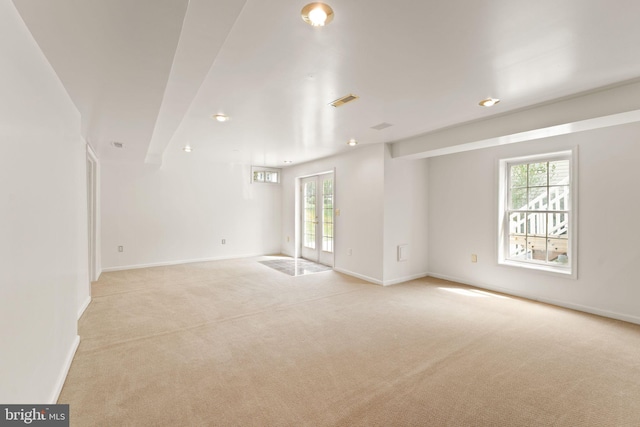 42935 Palliser Ct, Leesburg, VA 20176 - unfurnished room with baseboards, light carpet, and plenty of natural light