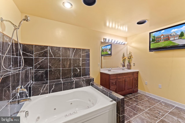 42935 Palliser Ct, Leesburg, VA 20176 - bathroom featuring a tub with jets, double vanity, and a sink