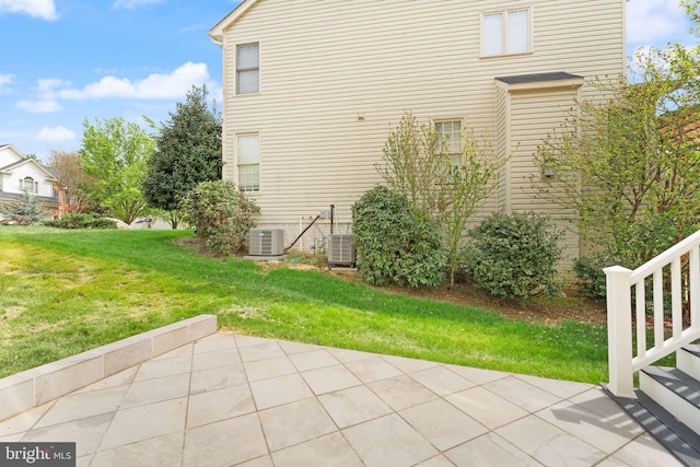 42935 Palliser Ct, Leesburg, VA 20176 - exterior space with central AC unit and a patio area