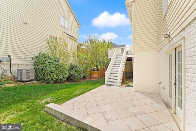 42935 Palliser Ct, Leesburg, VA 20176 - view of patio / terrace featuring central AC and stairway