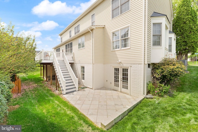 42935 Palliser Ct, Leesburg, VA 20176 - back of property featuring a patio area, a wooden deck, a yard, and stairs