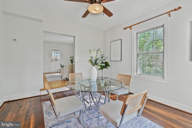 2418 Forest Glen Rd, Silver Spring, MD 20910 - dining space with baseboards, ceiling fan, and wood finished floors