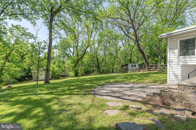 2418 Forest Glen Rd, Silver Spring, MD 20910 - view of yard with a storage shed, fence, and an outbuilding