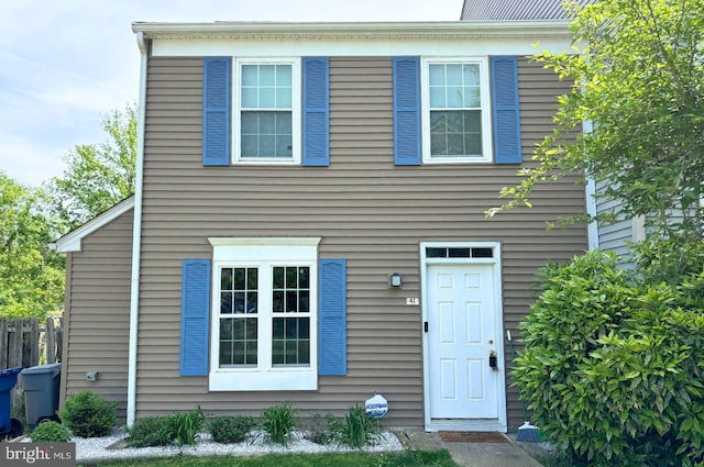 view of front of property with fence