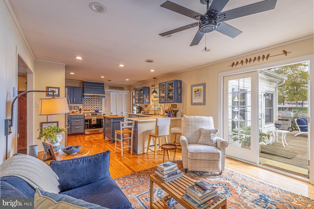 2231 Whays Creek Rd, Reedville, VA 22539 - living room with recessed lighting, ornamental molding, ceiling fan, and light wood finished floors
