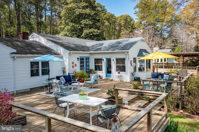 2231 Whays Creek Rd, Reedville, VA 22539 - deck with outdoor lounge area and outdoor dining area
