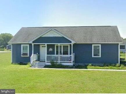 view of front of home featuring a porch and a front yard