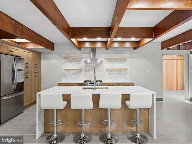 kitchen featuring smart refrigerator, beam ceiling, light stone countertops, and tasteful backsplash