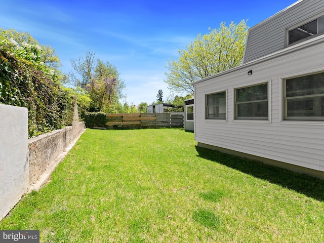 view of yard featuring fence