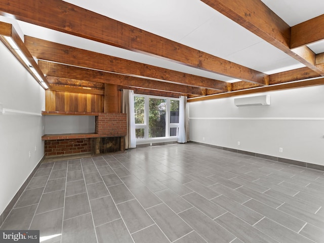 unfurnished living room with baseboards, an AC wall unit, and beam ceiling