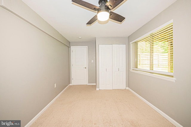 12136 Pawnee Dr, Gaithersburg, MD 20878 - unfurnished bedroom with carpet floors, a closet, and ceiling fan