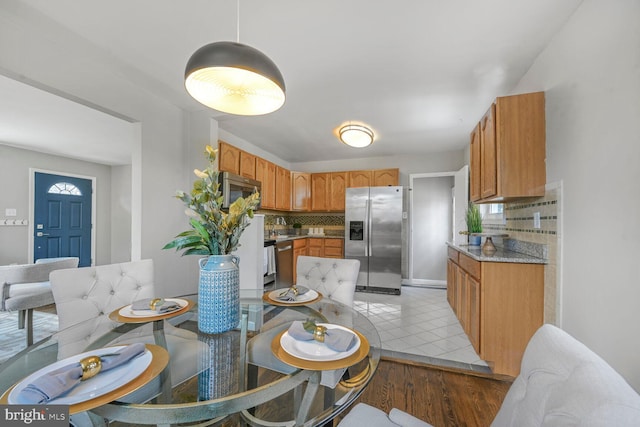 12011 Ashley Dr, Rockville, MD 20852 - dining space with light wood-style floors