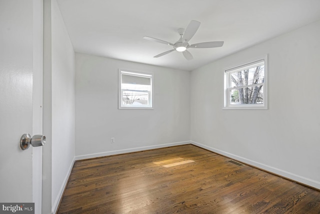 12011 Ashley Dr, Rockville, MD 20852 - unfurnished room featuring baseboards, plenty of natural light, a ceiling fan, and wood finished floors