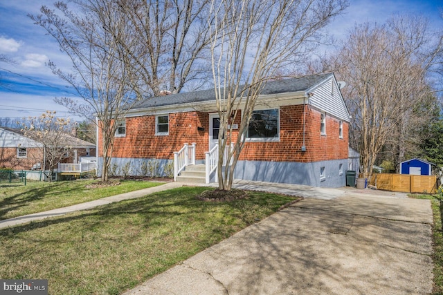 12011 Ashley Dr, Rockville, MD 20852 - view of front of property featuring brick siding, fence, driveway, and a front lawn