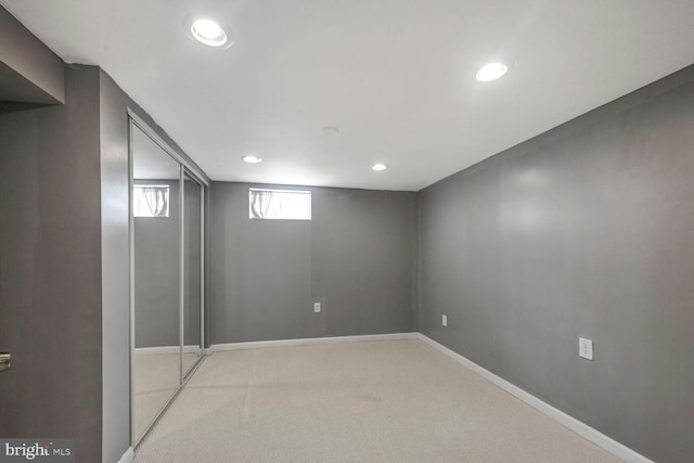 12011 Ashley Dr, Rockville, MD 20852 - basement with baseboards, recessed lighting, and light colored carpet