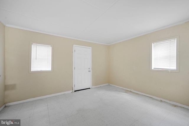 12011 Ashley Dr, Rockville, MD 20852 - empty room with a healthy amount of sunlight, baseboards, crown molding, and light floors