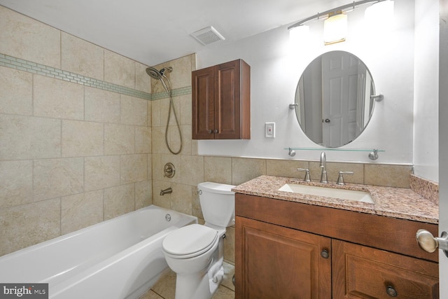 12011 Ashley Dr, Rockville, MD 20852 - full bath with bathtub / shower combination, vanity, toilet, tile walls, and visible vents