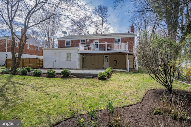 12011 Ashley Dr, Rockville, MD 20852 - rear view of house with a yard, a deck, fence, and a chimney