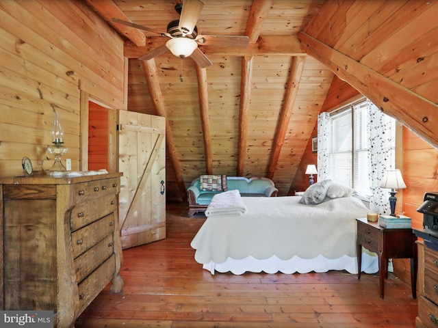 bedroom with wooden ceiling, vaulted ceiling with beams, and wood-type flooring
