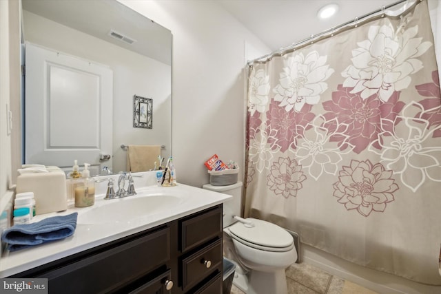 bathroom featuring visible vents, toilet, shower / bath combination with curtain, tile patterned floors, and vanity