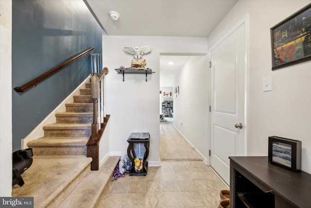 stairway with baseboards