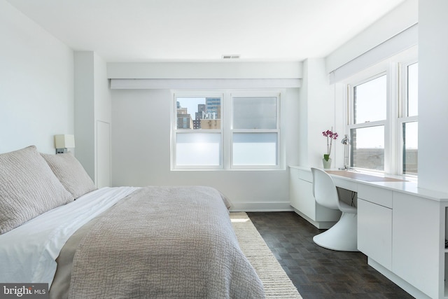 1830 Rittenhouse Sq Unit 17B, Philadelphia, PA 19103 - bedroom with built in study area, visible vents, and multiple windows