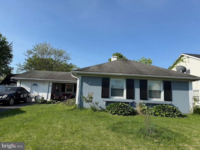 40 Madestone Ln, Willingboro, NJ 08046 - ranch-style home featuring a chimney, a front yard, and brick siding