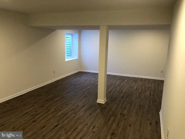 308 Nowland Ln, Delaware City, DE 19706 - basement with dark wood finished floors and baseboards