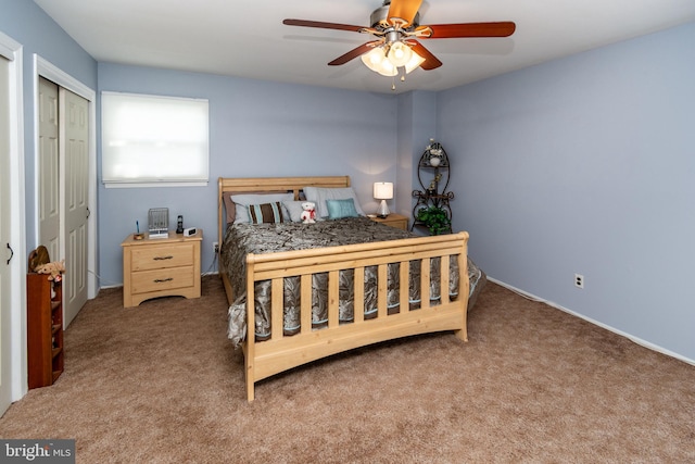 carpeted bedroom featuring ceiling fan