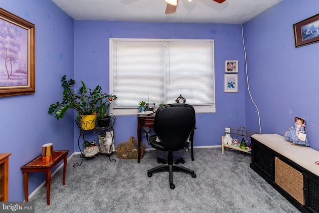 home office with a ceiling fan, a wealth of natural light, carpet floors, and baseboards