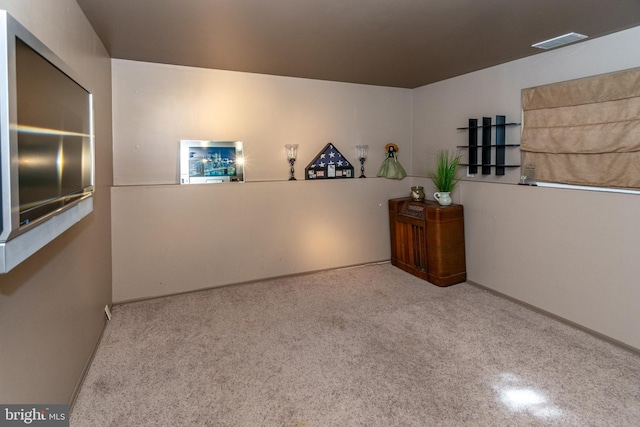 spare room featuring visible vents