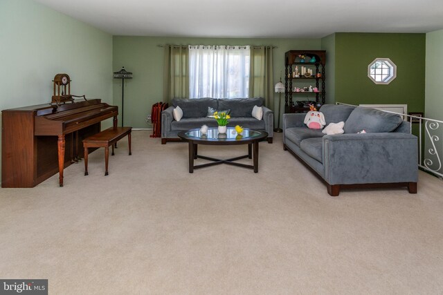 living room featuring light carpet