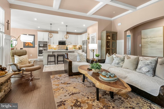 3058 Sunny Ridge Dr, Odenton, MD 21113 - living area with arched walkways, coffered ceiling, recessed lighting, beamed ceiling, and wood finished floors