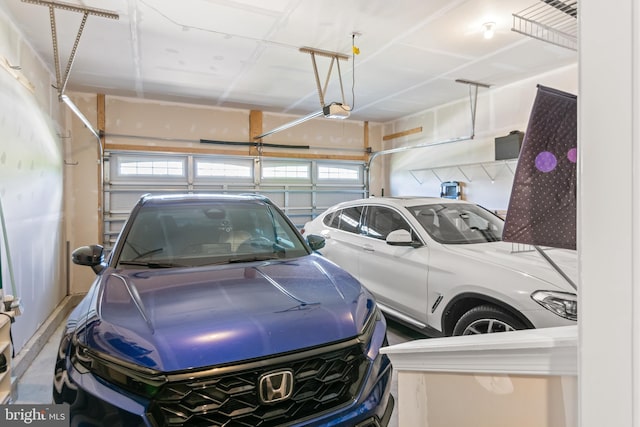 3058 Sunny Ridge Dr, Odenton, MD 21113 - garage featuring a garage door opener