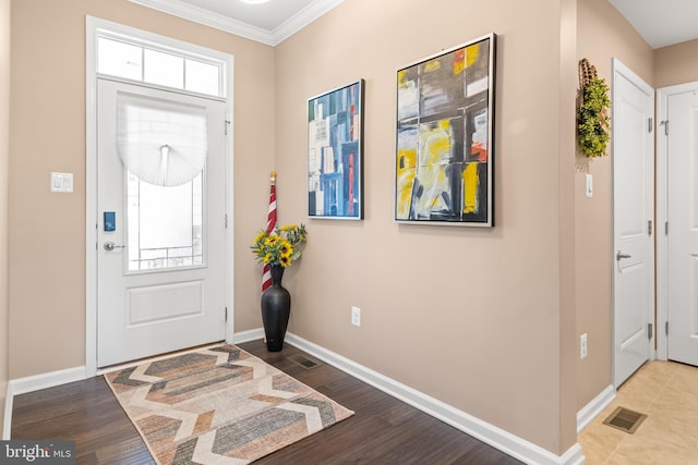 3058 Sunny Ridge Dr, Odenton, MD 21113 - entryway with baseboards, crown molding, and wood finished floors