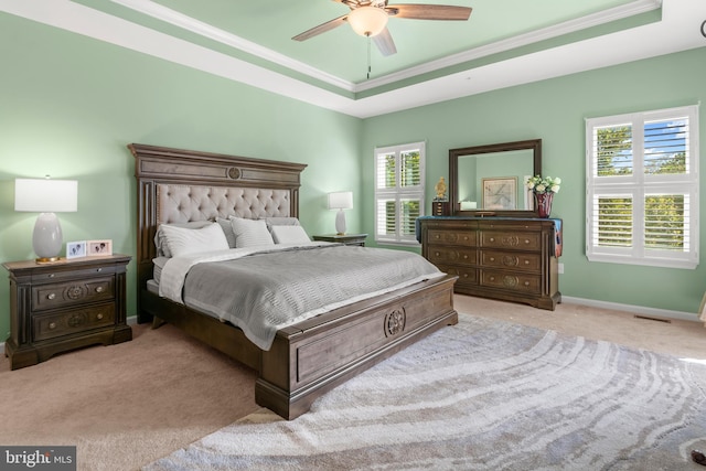 3058 Sunny Ridge Dr, Odenton, MD 21113 - bedroom featuring a raised ceiling, multiple windows, carpet, and ornamental molding