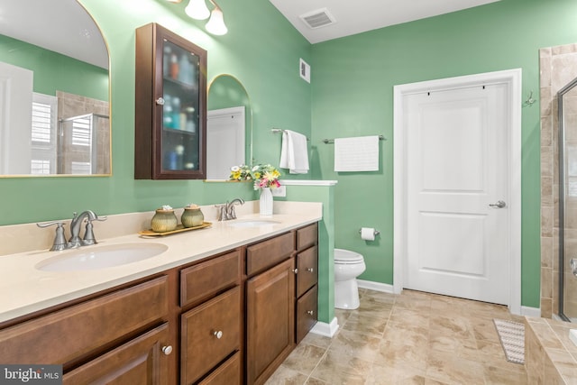 3058 Sunny Ridge Dr, Odenton, MD 21113 - bathroom featuring a stall shower, double vanity, toilet, and baseboards