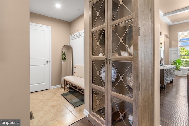 3058 Sunny Ridge Dr, Odenton, MD 21113 - wine room with arched walkways, baseboards, and tile patterned floors